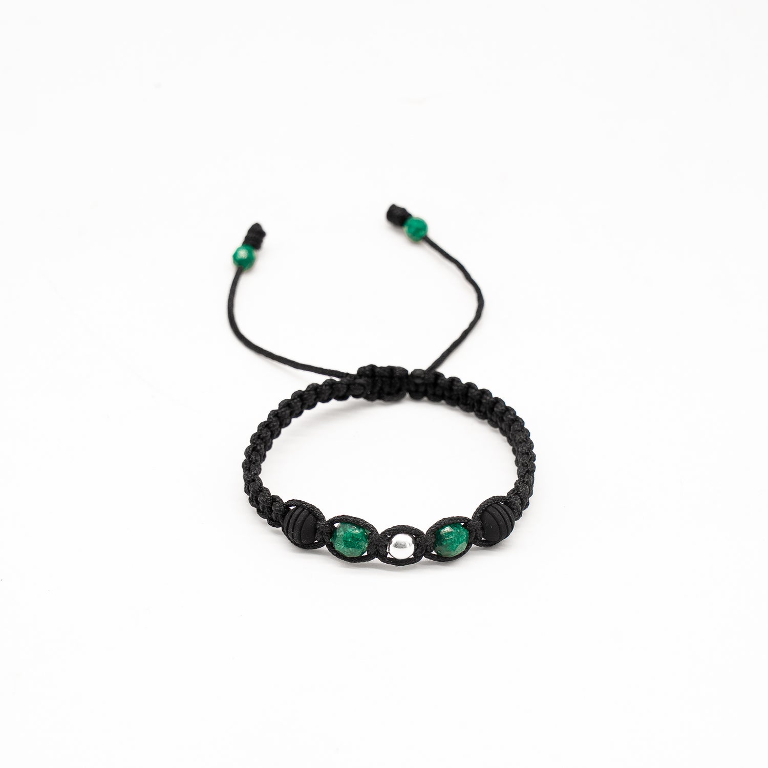 Void: Brazalete con 2 esmeraldas naturales encapsuladas, 2 esferas de neopreno y 1 esfera de plata